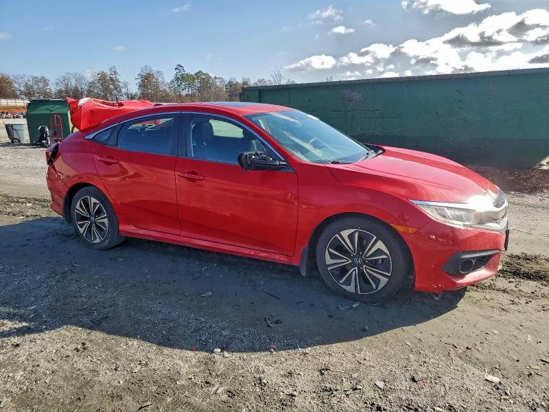Photo 4 from auction – 2016 HONDA CIVIC EX with VIN 2HGFC1F4XGH657994