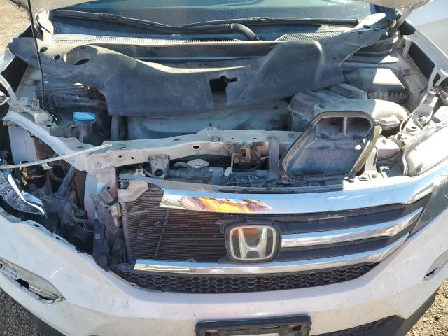 Photo 12 from auction – 2018 HONDA PILOT EXL with VIN 5FNYF6H60JB043334