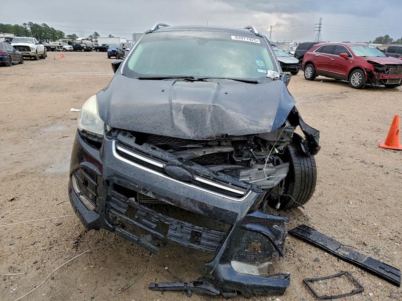 Photo 5 from auction – 2015 FORD ESCAPE TIT with VIN 1FMCU0J90FUB31179