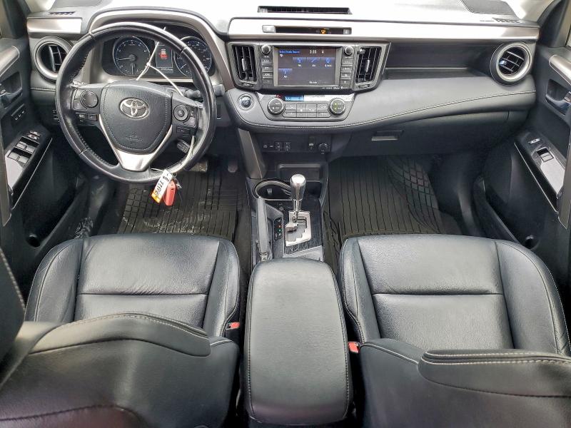 Photo 8 from auction – 2016 TOYOTA RAV4 with VIN JTMYFREV0GJ099417