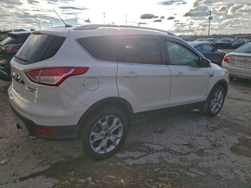 Photo 3 from auction – 2016 FORD ESCAPE TIT with VIN 1FMCU9J95GUC71704