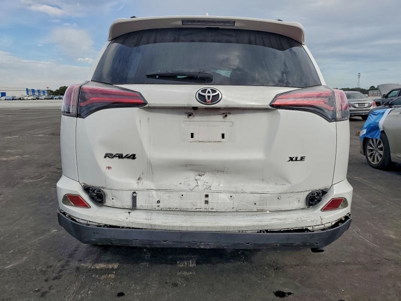 Photo 6 from auction – 2017 TOYOTA RAV4 XLE with VIN JTMWFREV9HD103083