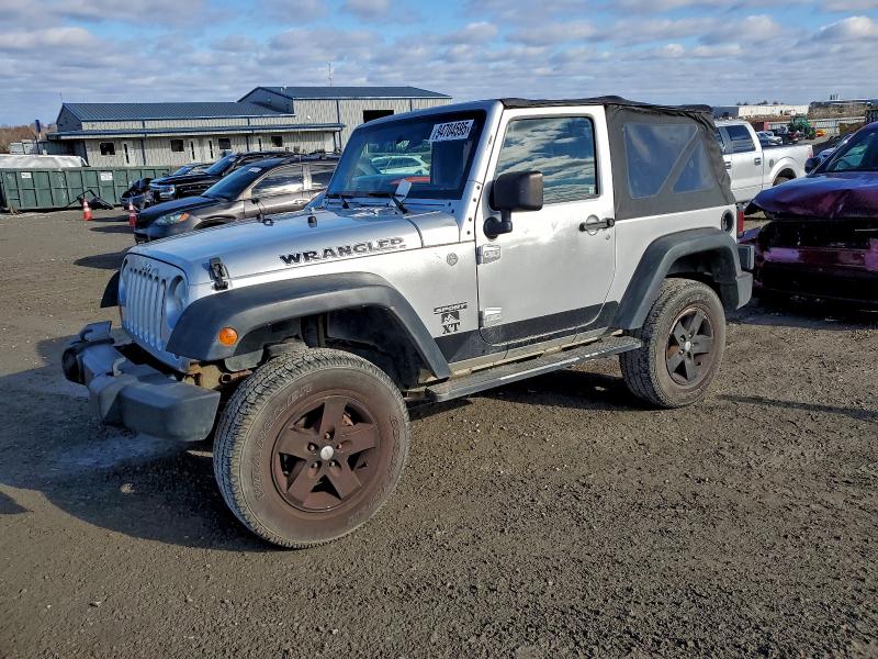 JEEP WRANGLER S 2011 with VIN 1J4AA2D14BL517720 - Photo from auction