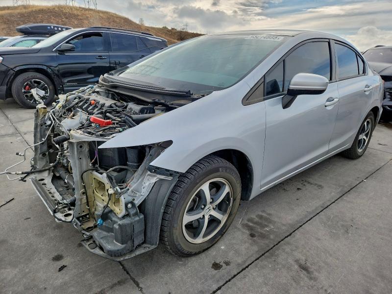 HONDA CIVIC SE 2015 with VIN 2HGFB2F73FH527671 - Photo from auction