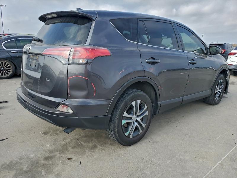 Photo 3 from auction – 2018 TOYOTA RAV4 LE with VIN JTMZFREV3JJ208397