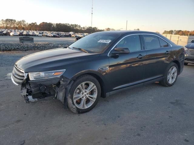 FORD TAURUS SEL 2014 with VIN 1FAHP2E82EG177579 - Photo from auction