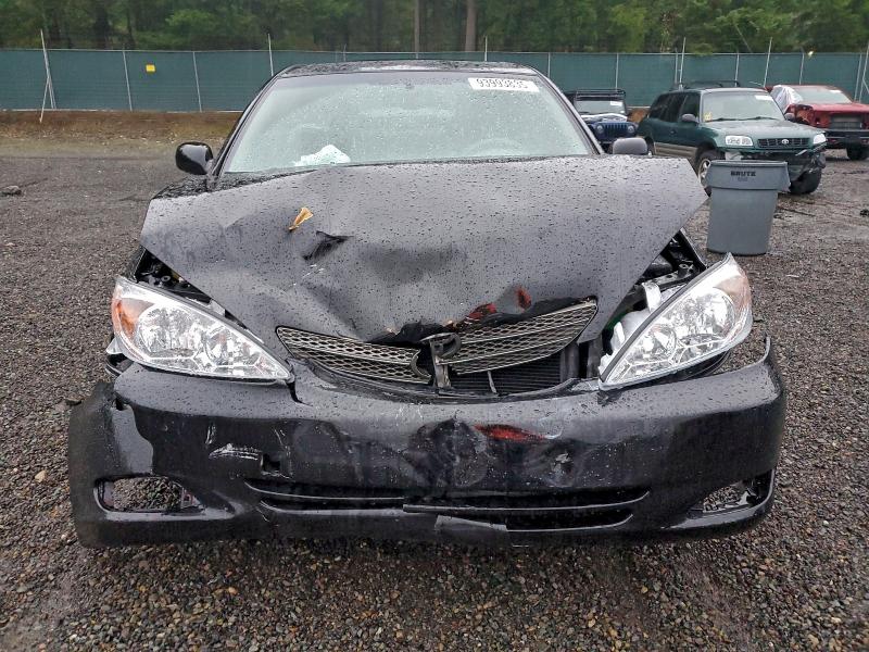 Photo 5 from auction – 2002 TOYOTA CAMRY LE with VIN JTDBF30K020025820