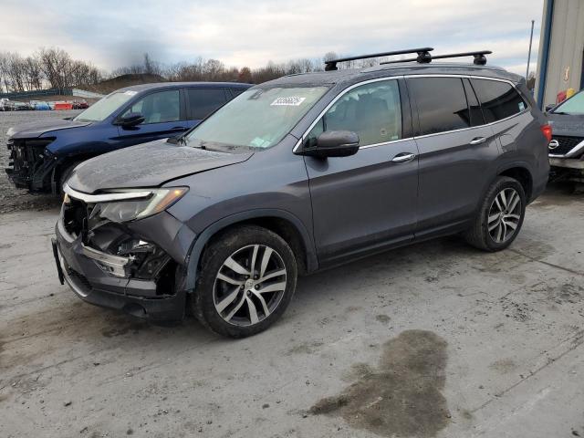 Photo 1 from auction – 2018 HONDA PILOT TOUR with VIN 5FNYF6H94JB064214