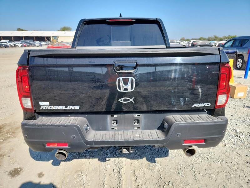 Photo 6 from auction – 2023 HONDA RIDGELINE with VIN 5FPYK3F77PB065787