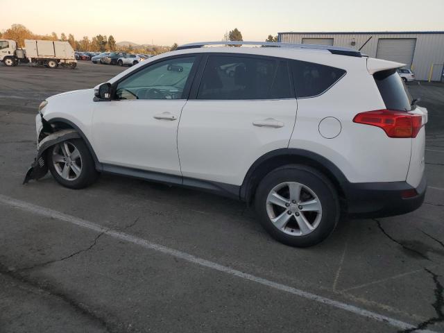 Photo 2 from auction – 2014 TOYOTA RAV4 XLE with VIN JTMWFREV6ED026040