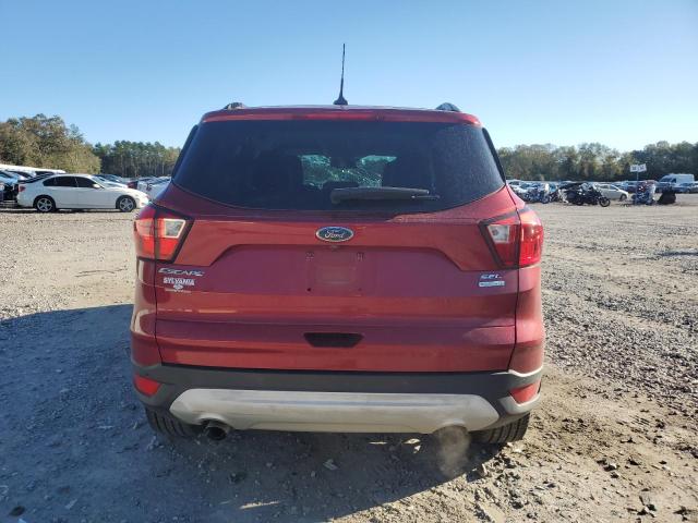 Foto 6 de la subasta – 2019 FORD ESCAPE con VIN 1FMCU0HD0KUB20302