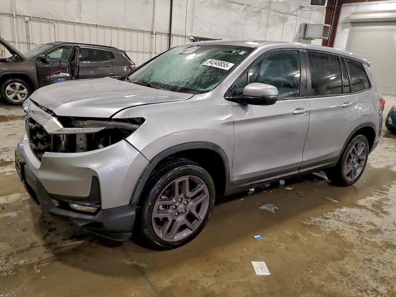 HONDA PASSPORT E 2022 with VIN 5FNYF8H5XNB008664 - Photo from auction