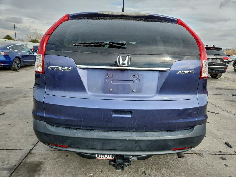 Photo 6 from auction – 2012 HONDA CR-V with VIN JHLRM4H79CC020158