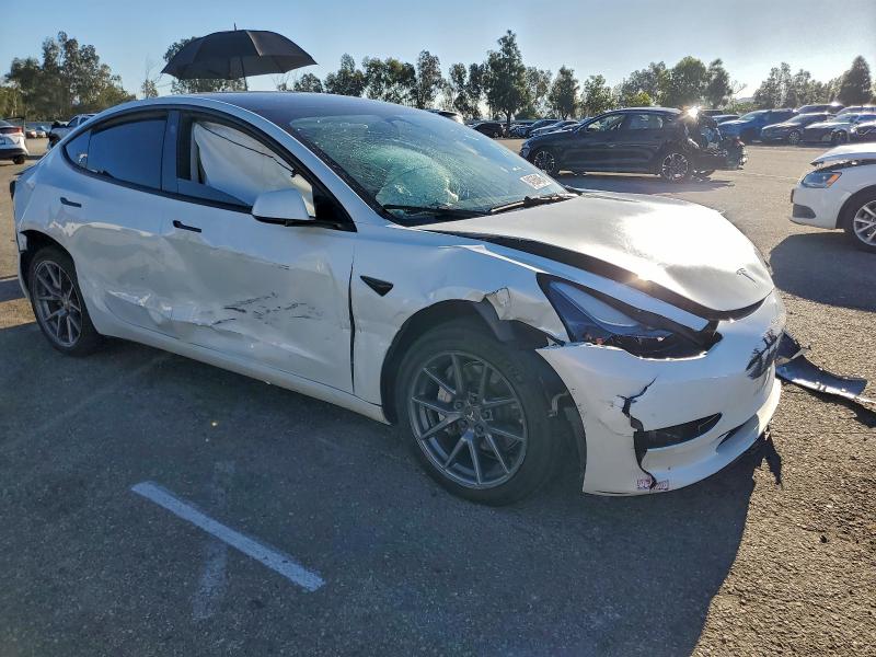 Photo 4 from auction – 2023 TESLA MODEL 3 with VIN 5YJ3E1EA4PF429207