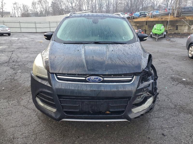 Photo 5 from auction – 2014 FORD ESCAPE TIT with VIN 1FMCU9J92EUB21563