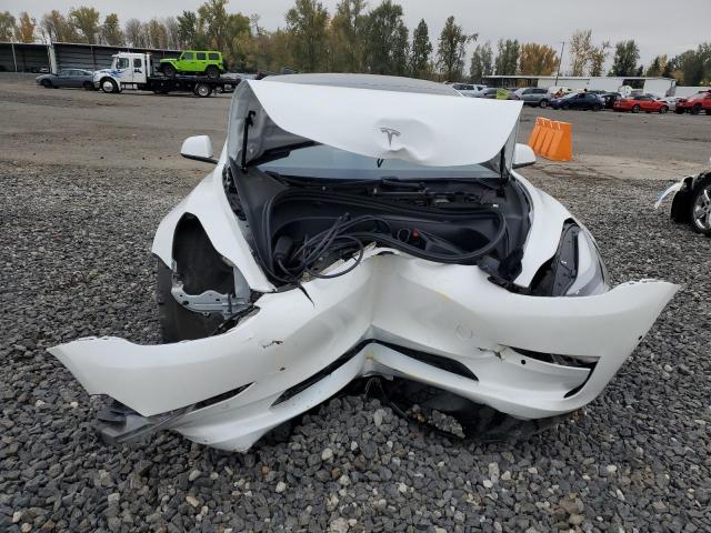 Photo 5 from auction – 2021 TESLA MODEL 3 with VIN 5YJ3E1EA7MF054134