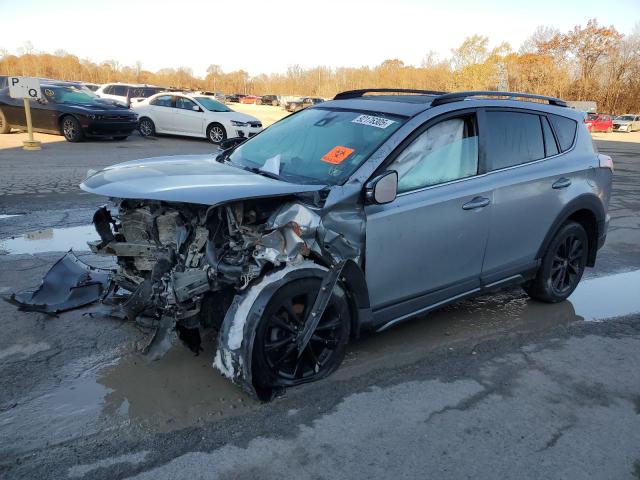 TOYOTA RAV4 ADVEN 2018 with VIN 2T3RFREV9JW697972 - Photo from auction
