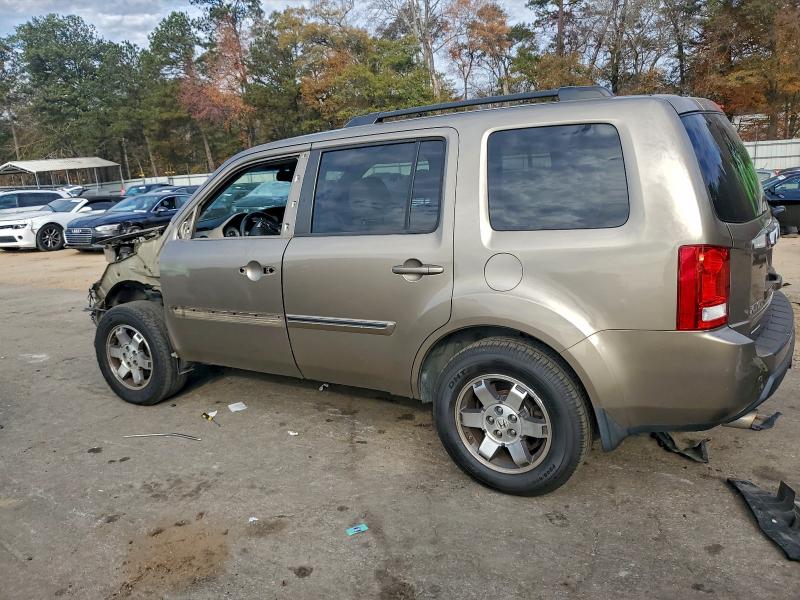 Photo 2 from auction – 2011 HONDA PILOT TOUR with VIN 5FNYF4H90BB008924