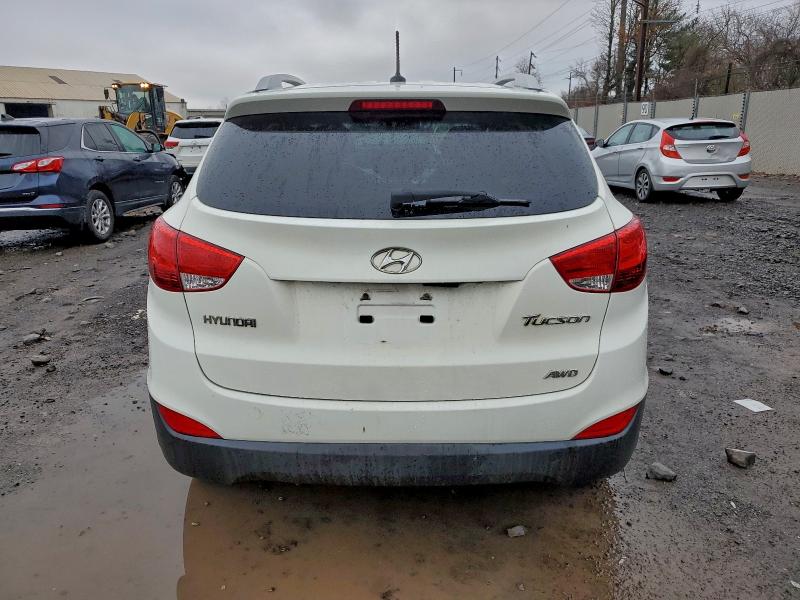 Photo 6 from auction – 2010 HYUNDAI TUCSON with VIN KM8JUCAC6AU080462