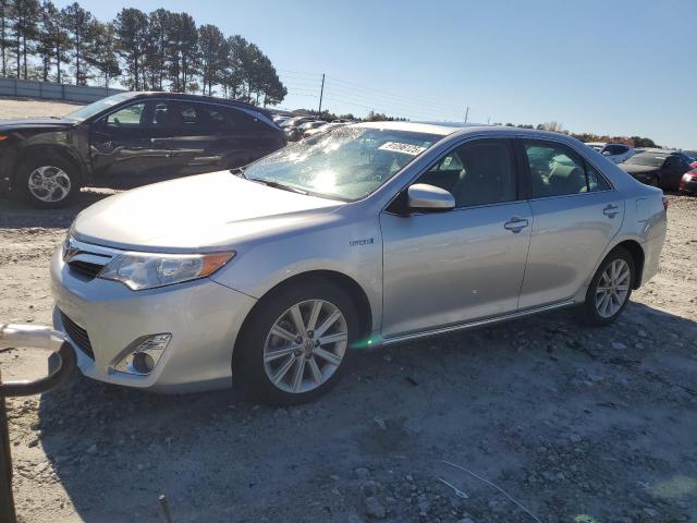 TOYOTA CAMRY HYBR 2013 with VIN 4T1BD1FK9DU074474 - Photo from auction