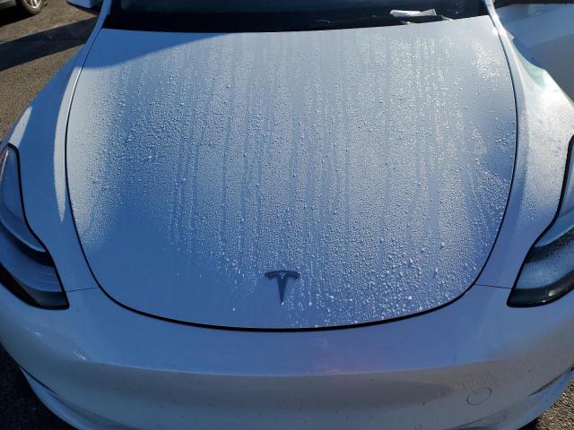 Photo 11 from auction – 2022 TESLA MODEL Y with VIN 7SAYGDEEXNF434397