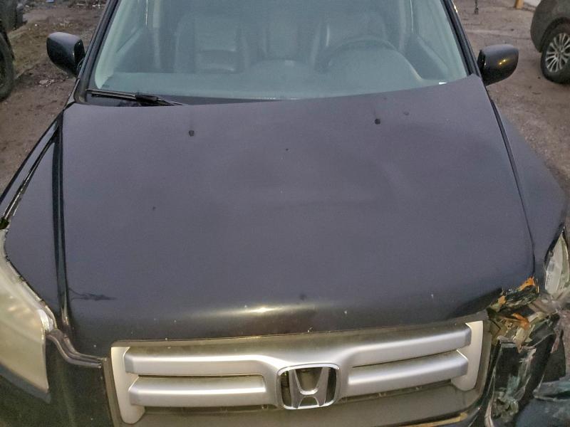 Photo 12 from auction – 2006 HONDA PILOT EX with VIN 2HKYF18616H530098