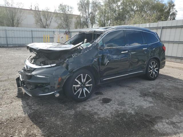 Photo 1 from auction – 2021 HONDA PILOT TOUR with VIN 5FNYF5H65MB038435