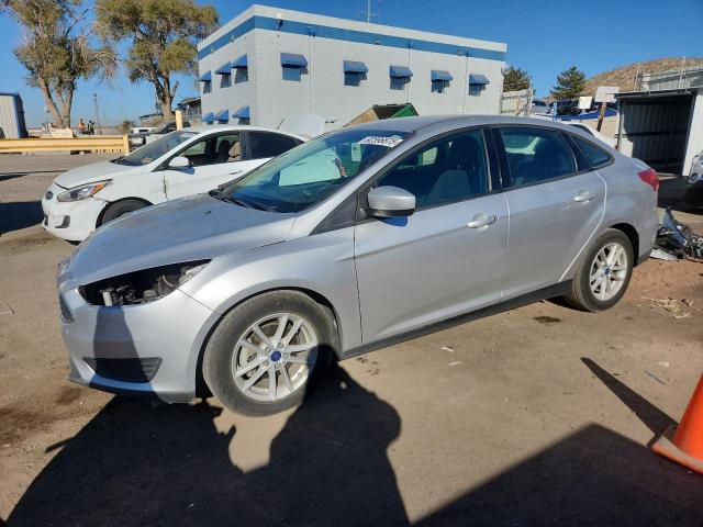 FORD FOCUS SE 2018 with VIN 1FADP3F25JL270113 - Photo from auction
