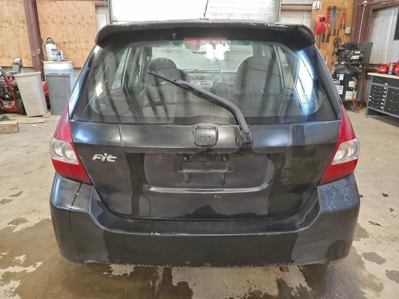 Photo 6 from auction – 2007 HONDA FIT with VIN JHMGD38407S801570