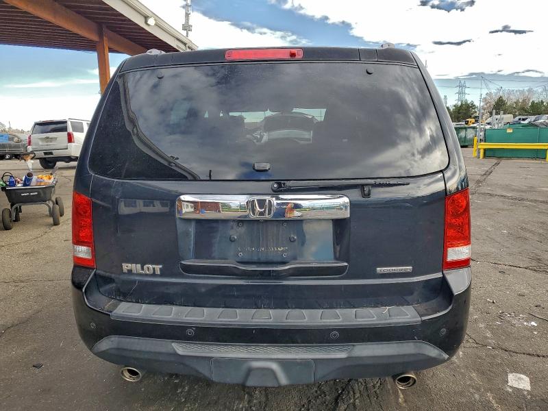 Photo 6 from auction – 2014 HONDA PILOT TOUR with VIN 5FNYF3H90EB008209