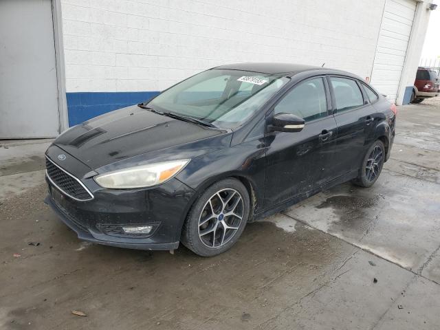 FORD FOCUS SE 2015 with VIN 1FADP3F25FL220853 - Photo from auction