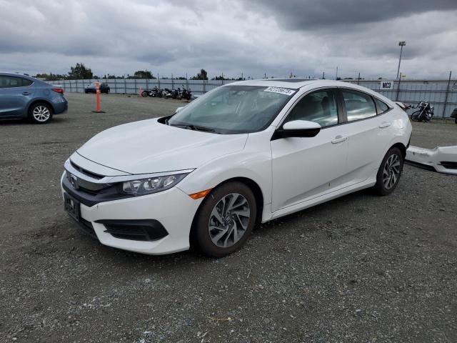 HONDA CIVIC EX 2018 with VIN 19XFC2F77JE208208 - Photo from auction