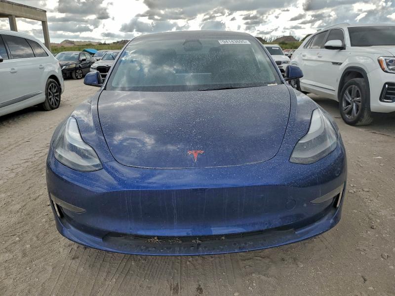 Photo 5 from auction – 2022 TESLA MODEL 3 with VIN 5YJ3E1EB5NF104927