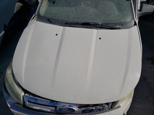 Photo 12 from auction – 2011 FORD FOCUS SE with VIN 1FAHP3FN0BW104139
