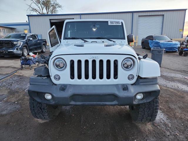 Photo 5 from auction – 2016 JEEP WRANGLER U with VIN 1C4BJWFG1GL191207