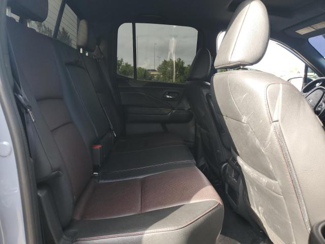 Photo 10 from auction – 2022 HONDA RIDGELINE with VIN 5FPYK3F80NB032023