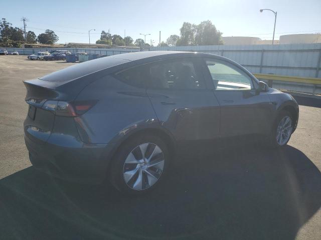 Photo 3 from auction – 2023 TESLA MODEL Y with VIN 7SAYGDED4PF978422