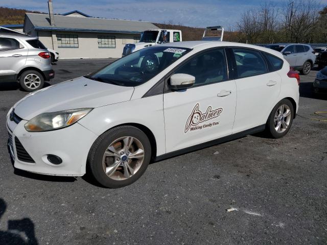 FORD FOCUS 2014 with VIN 1FADP3K28EL179090 - Photo from auction