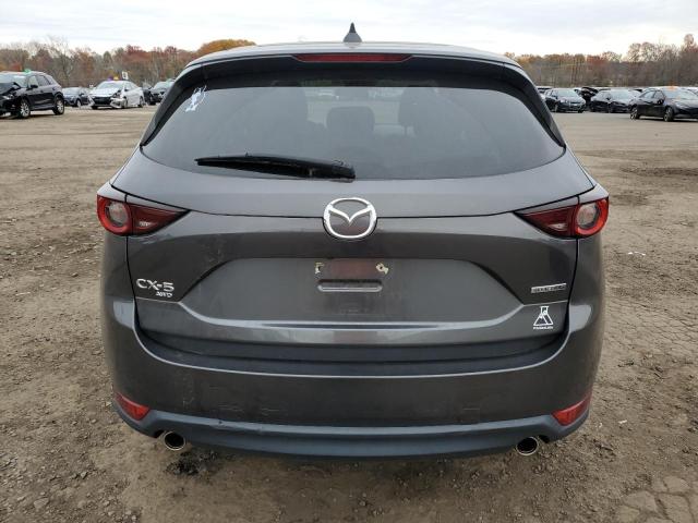Photo 6 from auction – 2021 MAZDA CX-5 TOURI with VIN JM3KFBCM9M0350452