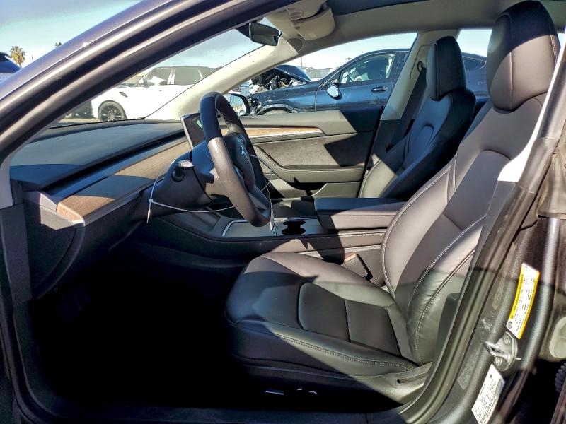 Photo 7 from auction – 2023 TESLA MODEL 3 with VIN 5YJ3E1EA8PF699945