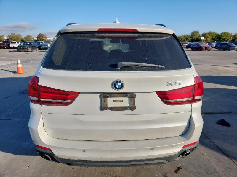 Photo 6 from auction – 2015 BMW X5 XDRIVE3 with VIN 5UXKR0C5XF0P02789