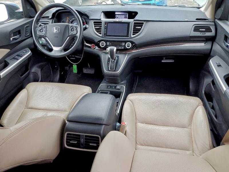 Photo 8 from auction – 2015 HONDA CR-V with VIN 5J6RM4H96FL047590
