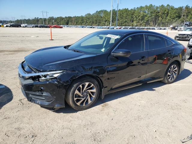HONDA CIVIC EX 2018 with VIN 19XFC2F79JE032021 - Photo from auction