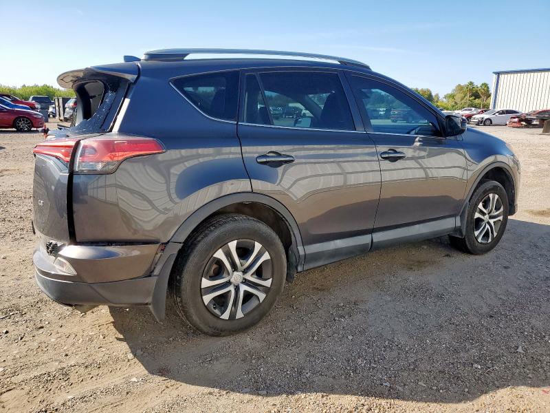 Photo 3 from auction – 2018 TOYOTA RAV4 LE with VIN 2T3ZFREVXJW451027