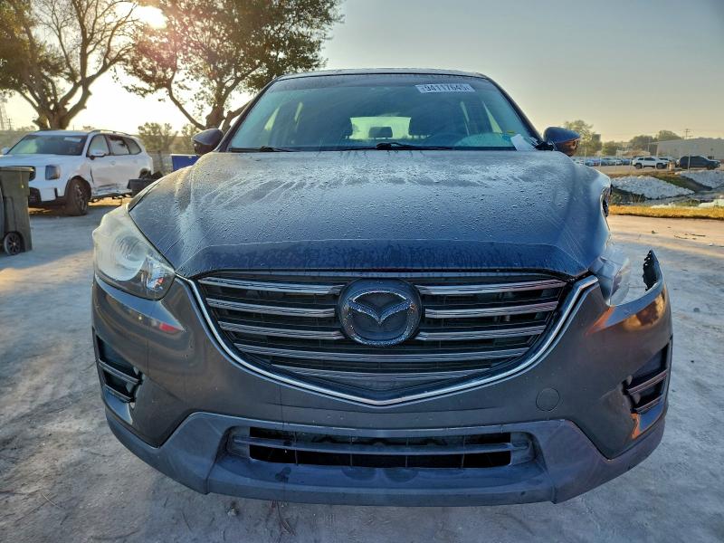 Photo 5 from auction – 2016 MAZDA CX-5 SPORT with VIN JM3KE2BY2G0877583