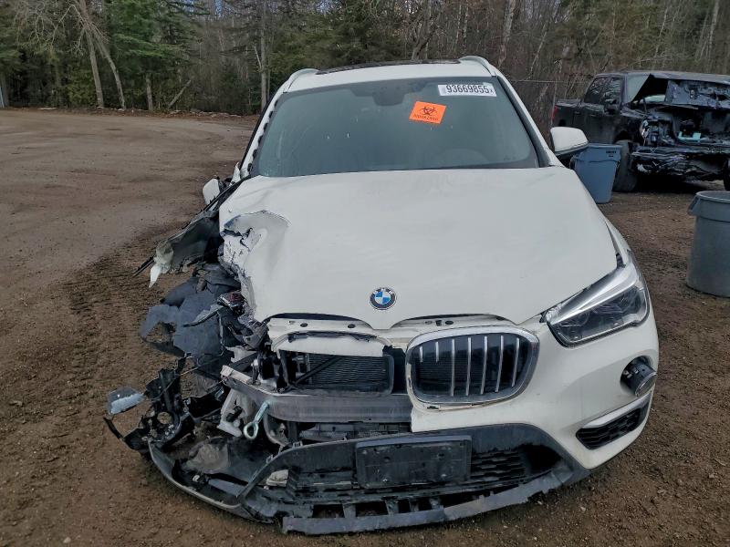 Photo 5 from auction – 2018 BMW X1 XDRIVE2 with VIN WBXHT3C37J5F90001