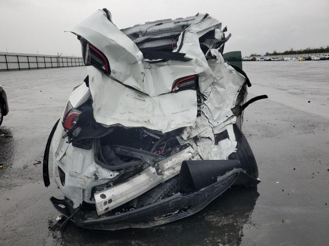 Photo 6 from auction – 2021 TESLA MODEL Y with VIN 5YJYGDEE3MF090438