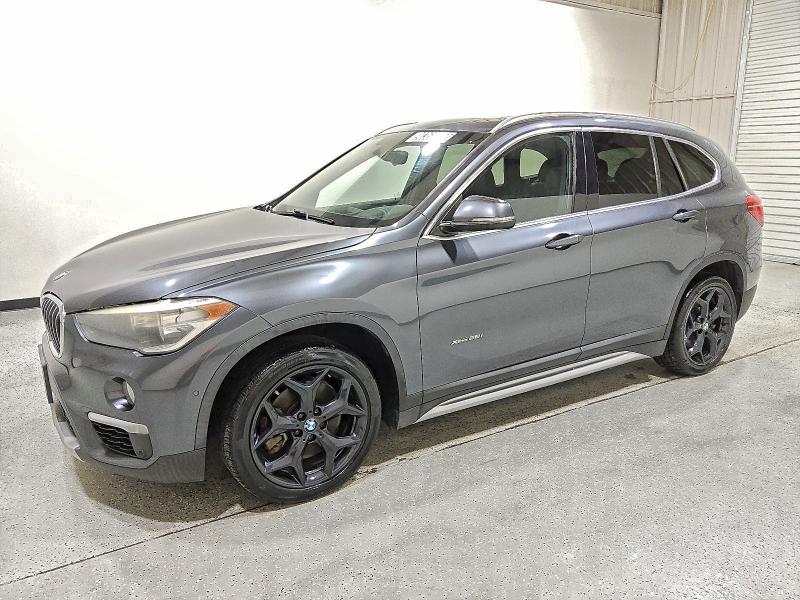 BMW X1 XDRIVE2 2016 with VIN WBXHT3C38GP887076 - Photo from auction