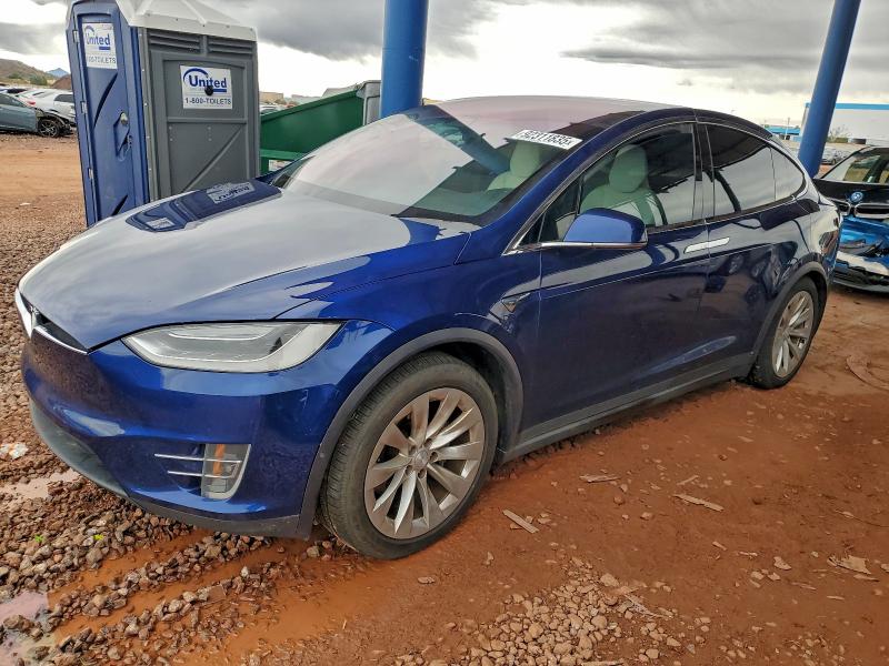 TESLA MODEL X 2017 with VIN 5YJXCBE29HF066510 - Photo from auction