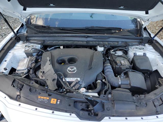 Photo 12 from auction – 2024 MAZDA CX-50 PREM with VIN 7MMVABDY2RN215569